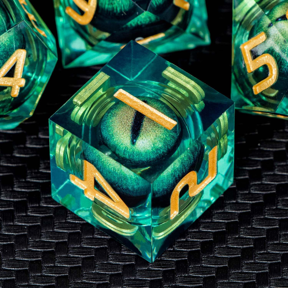 Close up of sharp edged resin dice liquid core