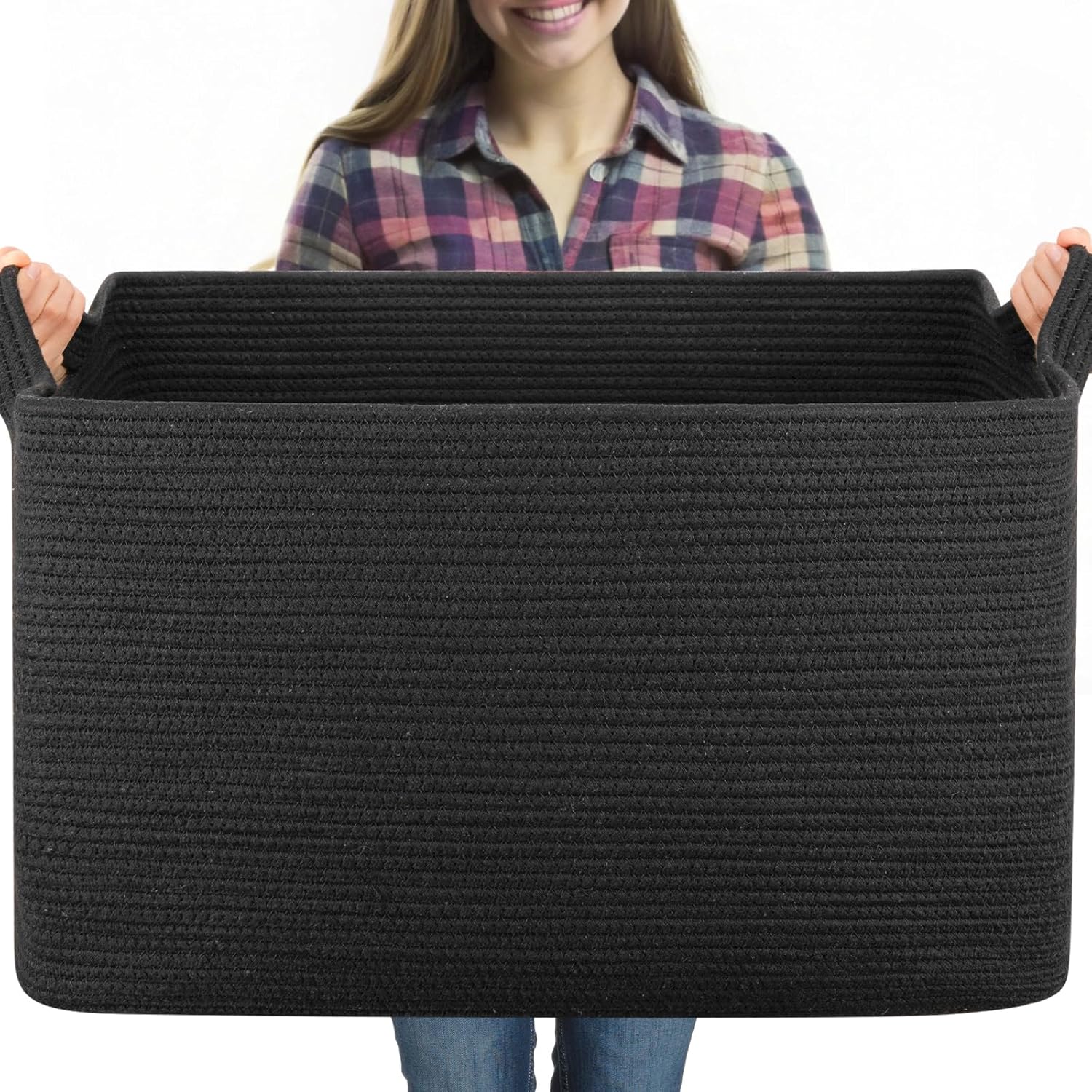 OIASKET extra large woven blanket basket front view in black color placed in a modern living room