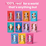 Twelve individual pouches of UNREAL milk chocolate gems arranged neatly