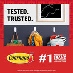 Command adhesive hook mounted on a clean white wall