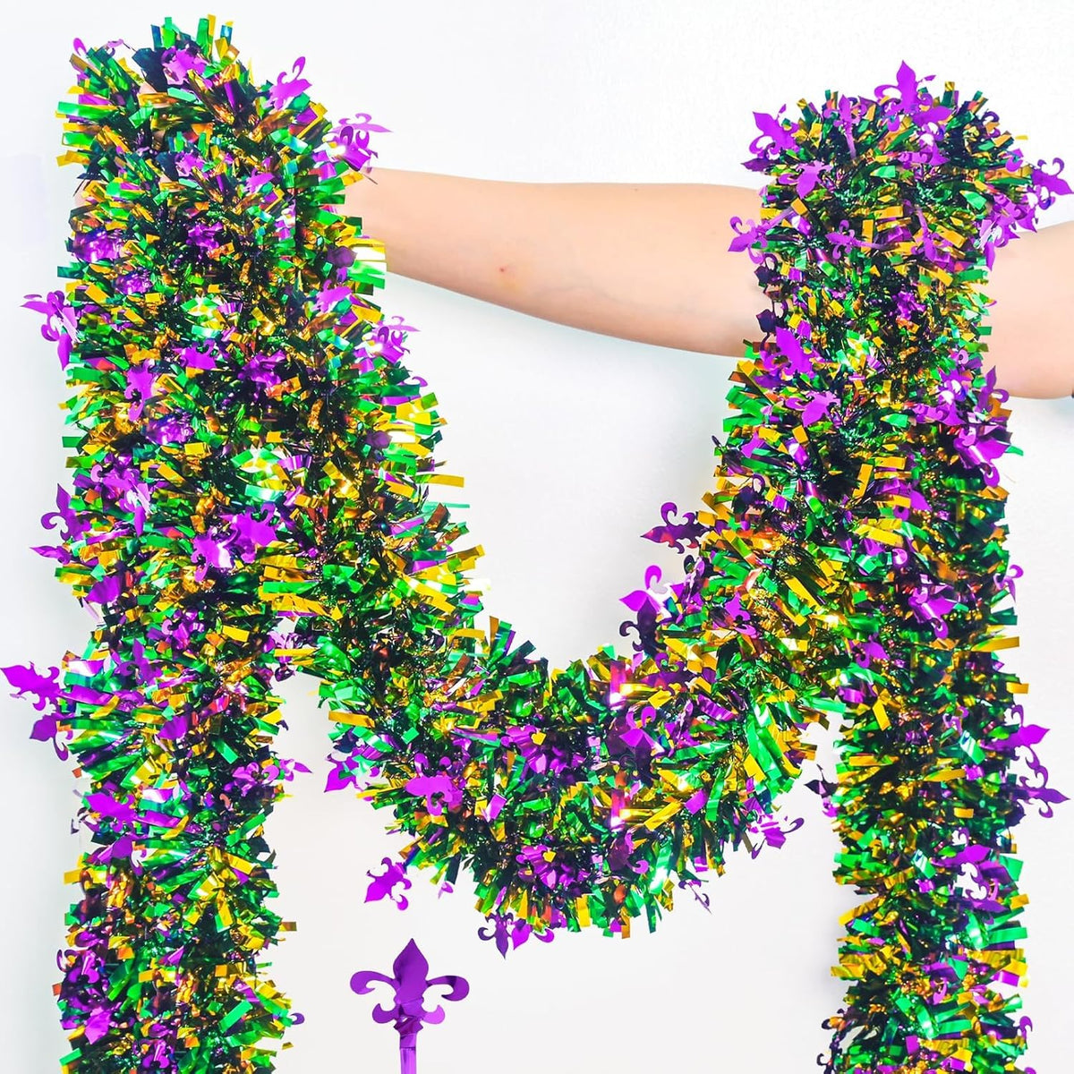 Mega-Loopolis Mardi Gras tinsel garland front view showing green gold purple colors