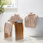 Belador face and body washcloth being used for gentle daily skincare