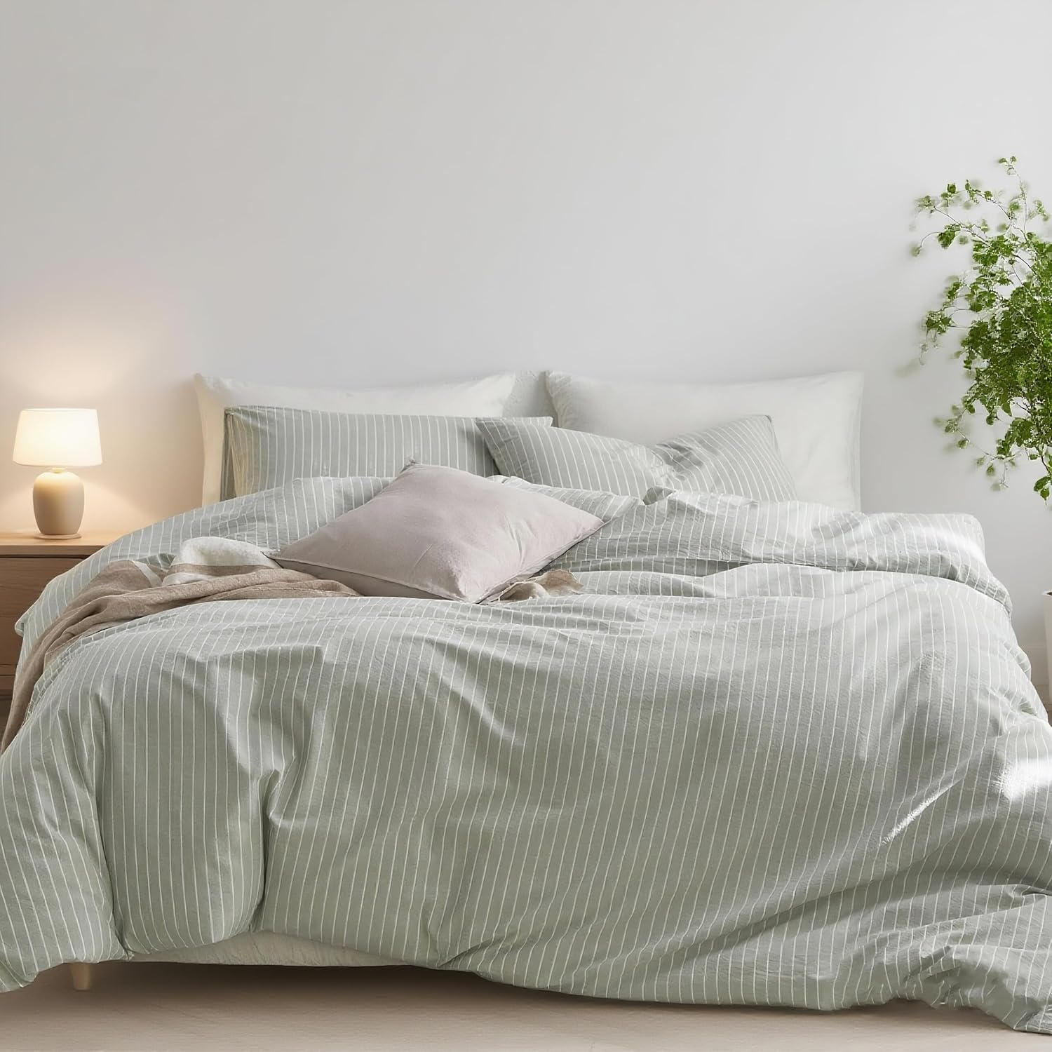 Nayoroom green striped duvet cover king size set laid out flat on a bed front view