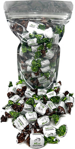 Close up of individually wrapped chocolate filled mint candy