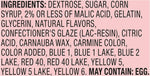 Crunchy tangy rainbow candy coating on a soft red gummy core