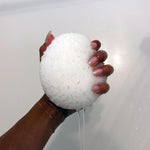 Kai Body Buffer lifestyle shot demonstrating gentle body exfoliation