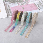 Close up of 6 rolls crystal rhinestone tape adhesive backing