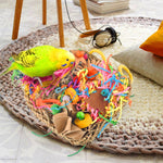 A colourful assortment of bird-safe wooden blocks and plastic chains on the KATUMO conure mat.