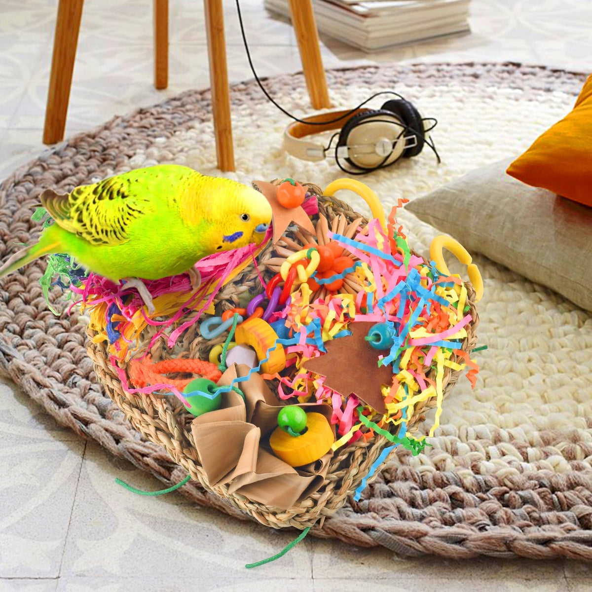 A colourful assortment of bird-safe wooden blocks and plastic chains on the KATUMO conure mat.