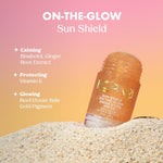 Kopari Sun Shield SPF 40 clear sunscreen stick application on arm for radiant finish