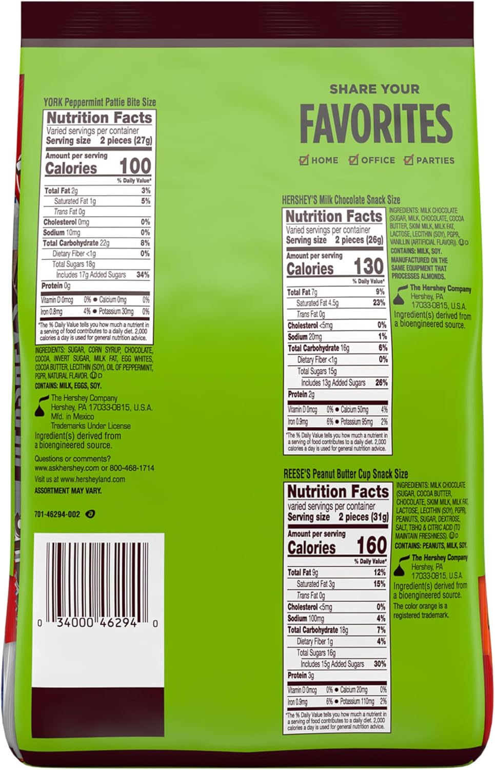Hershey's assorted snack size chocolate candy mix spread out on a table for party sharing.