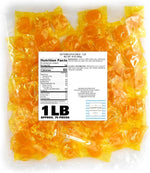 Close up of individually wrapped butterscotch hard candy discs