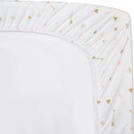 Side view of the fitted contoured changing pad cover highlighting the all-around elastic edge.