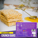 Close up view of healthy crunchy energy bars showcasing toasted sesame seeds and honey glaze.