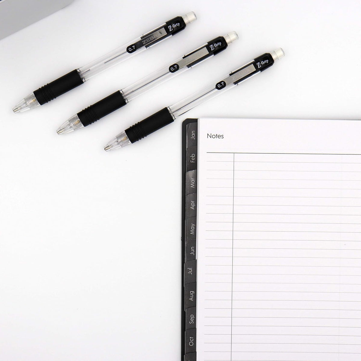 Top eraser cap and push button mechanism of the pencil