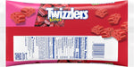 Imported TWIZZLERS cherry bites chewy candy pieces spilled out on a table