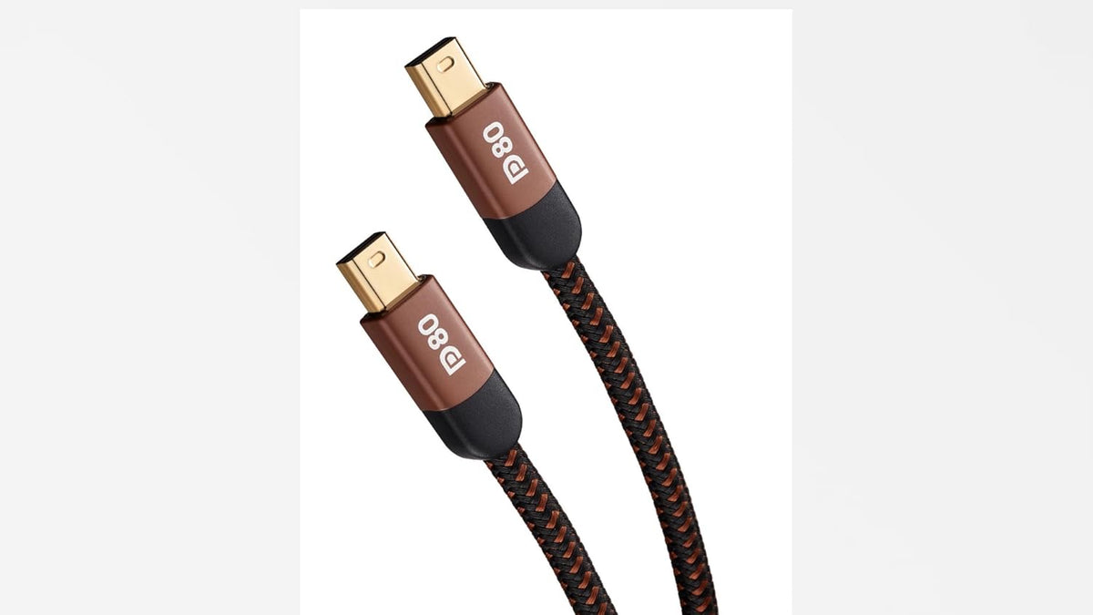 Professional grade video editing display connection cable showing heavy-duty strain relief boots.