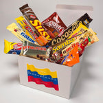 Close-up of premium individually wrapped Venezuelan snacks inside the Calesbox gift box.