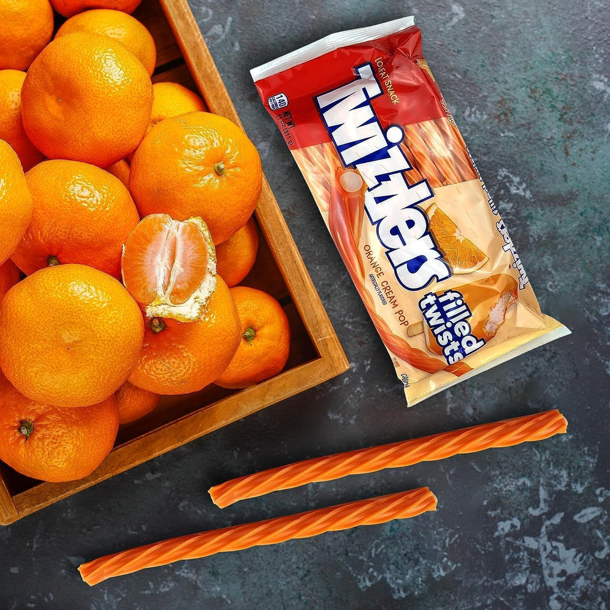 Back packaging details and nutrition facts of Twizzlers Orange Cream Twists.