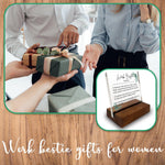 Vizuzi coworker leaving gift plaque in wooden stand