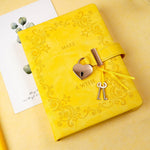 CAGIE yellow journal showing golden lock and key