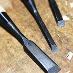 Detailed view of the Japanese white oak wood handle and iron hoop
