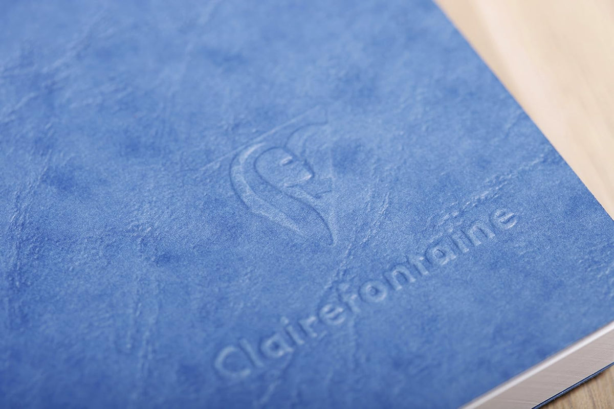 Clairefontaine Age Bag notebook showing elastic closure band and leather grain cover texture