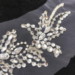 Close up of crystal beaded floral patch design