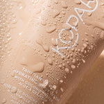 Kopari Tahitian Vanilla Hydrating Body Wash texture and gel lather display