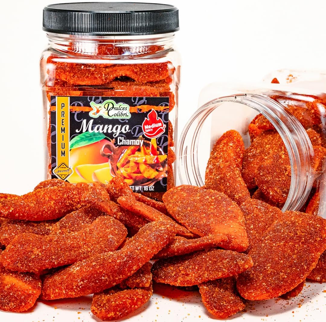 Close up of soft chewy mango slices with chamoy spice coating