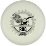 Innova Glow DX Roc Golf Disc front view showing classic bird stamp design and glow plastic.