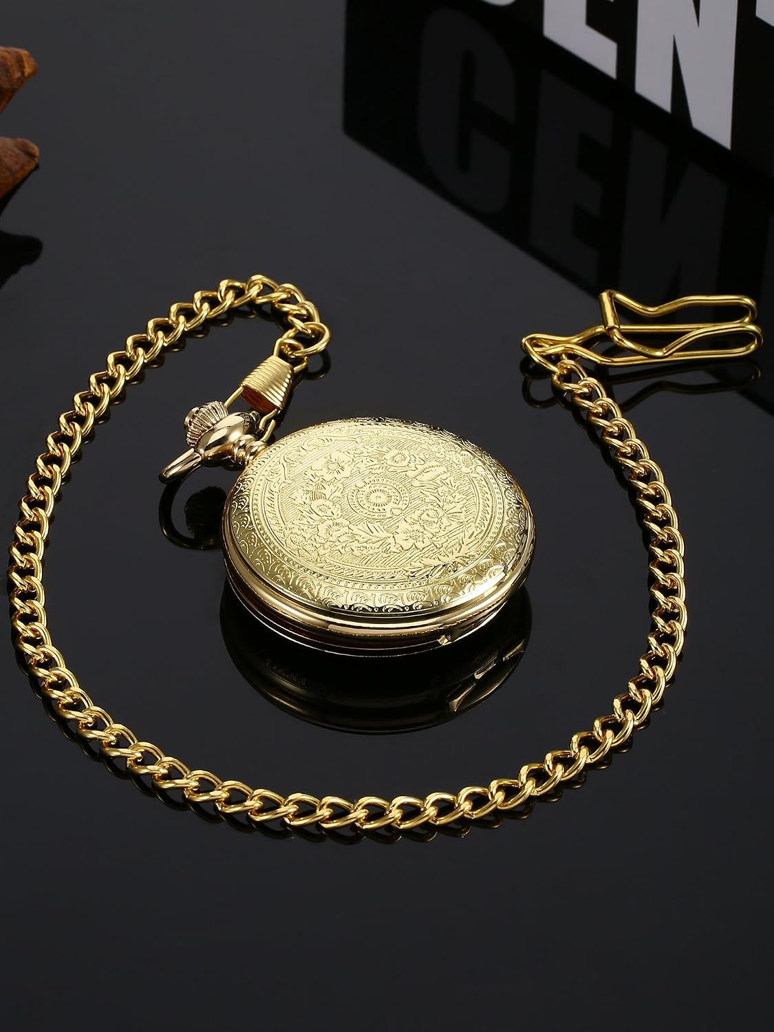 Pangda vintage pocket watch displayed alongside its secure hanging chain