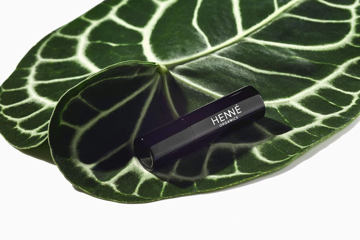 Henné Organics Luxury Lip Balm V2 texture and yellow-hued balm