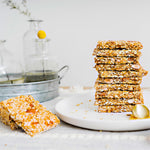 Natural honey nut and seed crunch brittle squares ready for healthy snacking