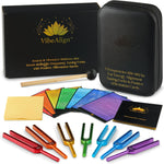 VibeAlign tuning forks set front view showing seven color coded instruments arranged neatly next to affirmation cards.