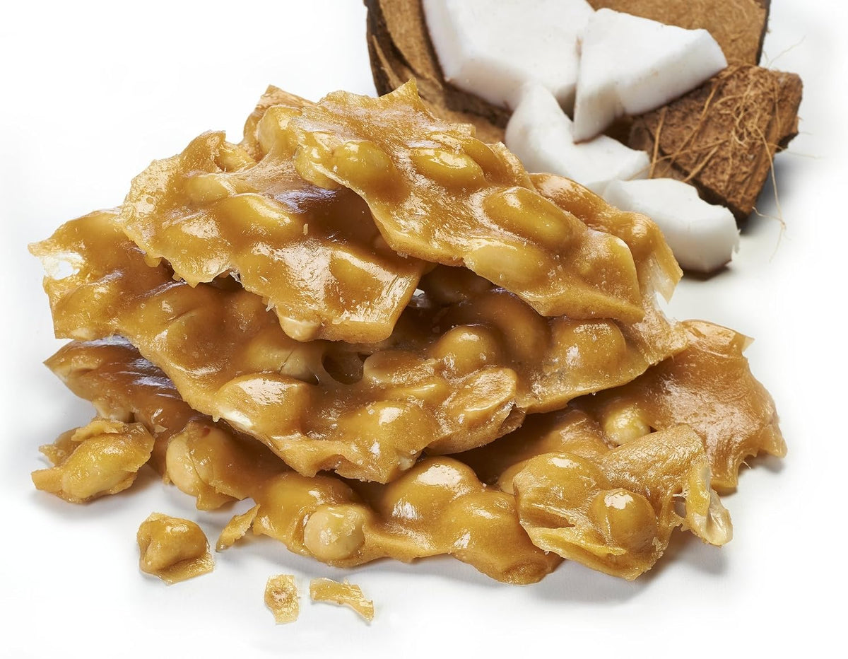 Artisan plant based old fashioned nut brittle showing crunchy roasted peanuts inside the pack