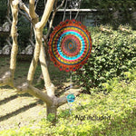 Fonmy 3D kinetic wind spinner showing reflective coating