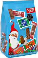 Imported Hershey Christmas chocolate assortment featuring festive Santa and tree shapes.