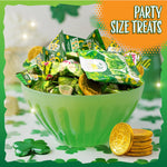 Bulk holiday sweets assortment spread out for St Patrick's Day party decorations