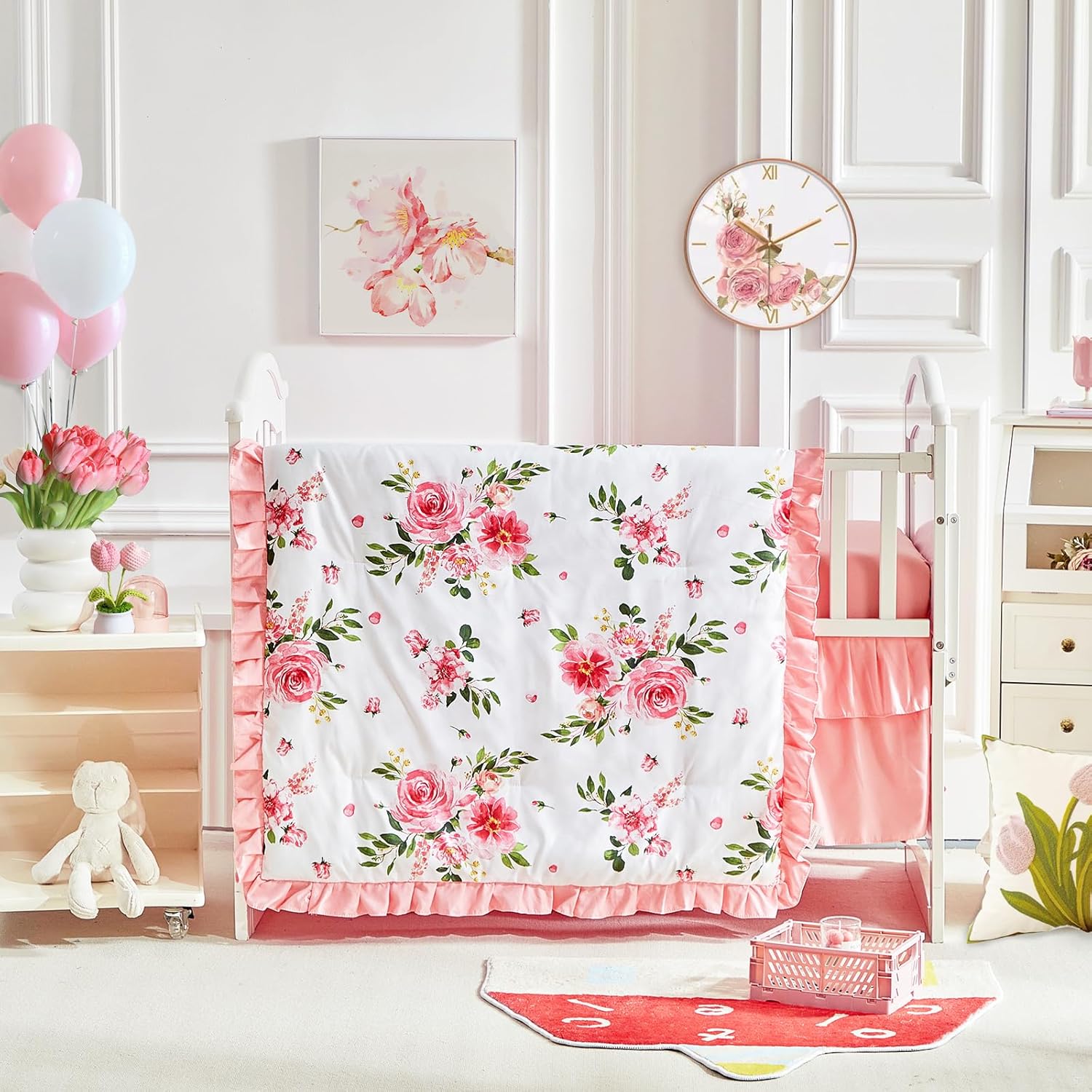 Uozzi Bedding three piece flowers crib bedding set front view showcasing the pink floral quilted comforter in a decorated nursery