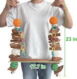 Unimaxlink bird swing perch with natural wood blocks and colorful rattan balls close up.