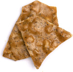 Premium imported dry roasted macadamia nut brittle with real Kona coffee flavor
