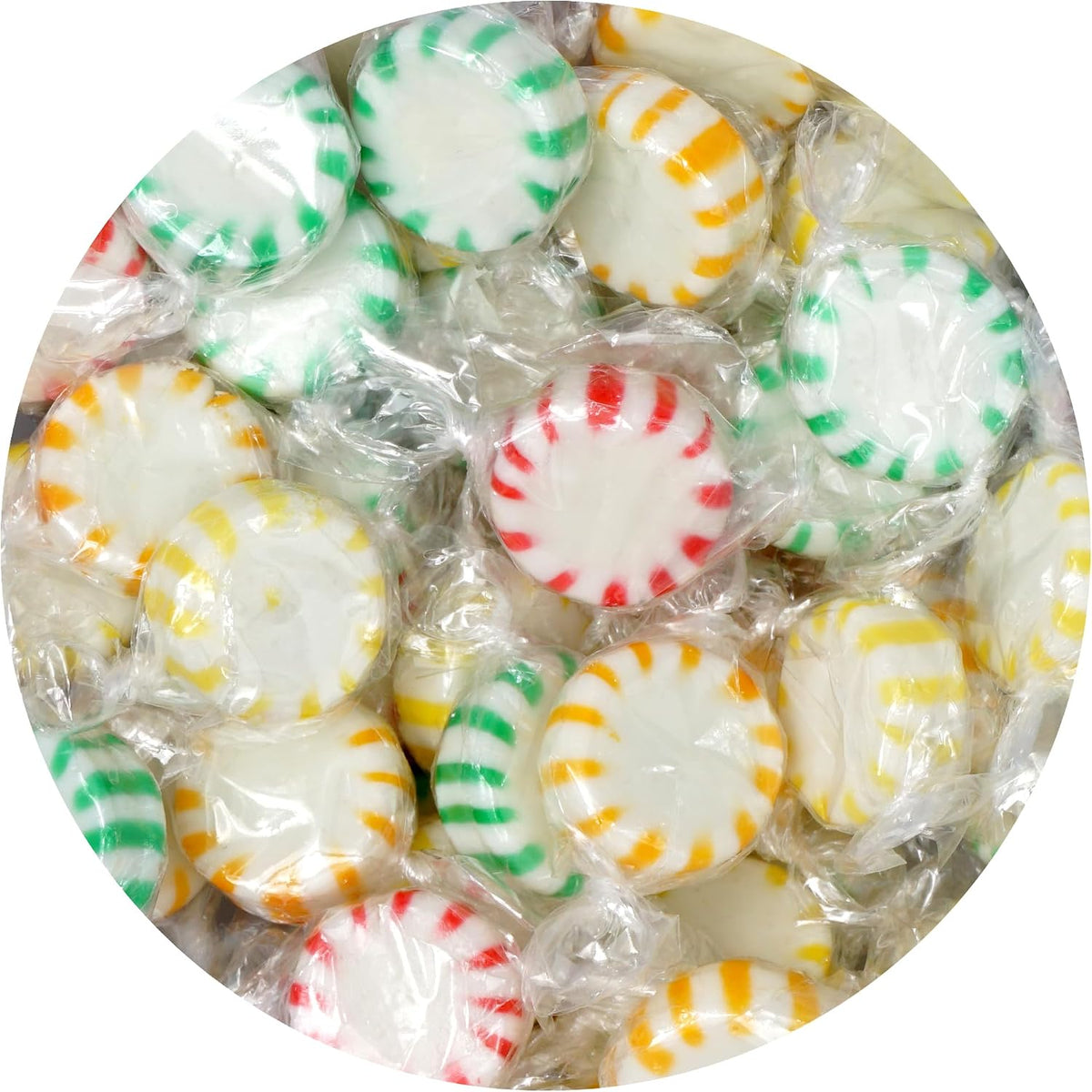 A handful of LaetaFood Arcor Starlight Peppermint hard candies showcasing the twist wrap packaging