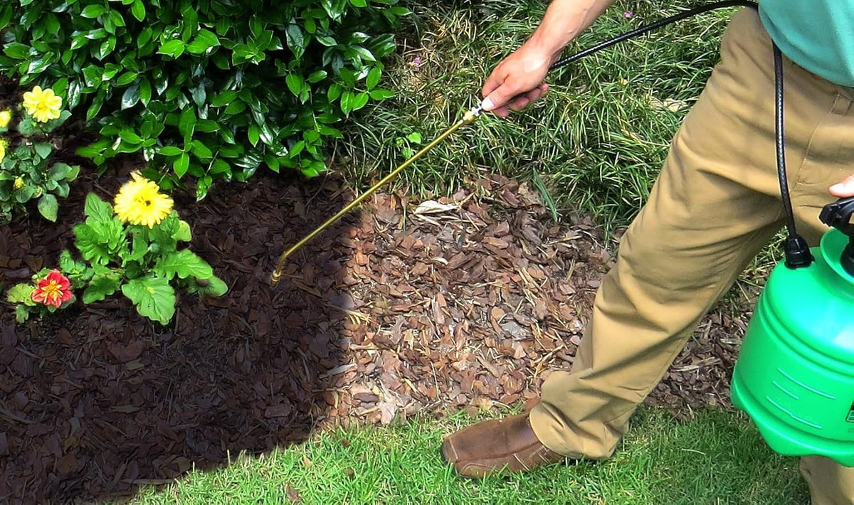 EnviroColor black mulch dye concentrate liquid poured in container
