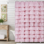Volens Pink Ruffle Shower Curtain front view hanging in a farmhouse rustic bathroom.