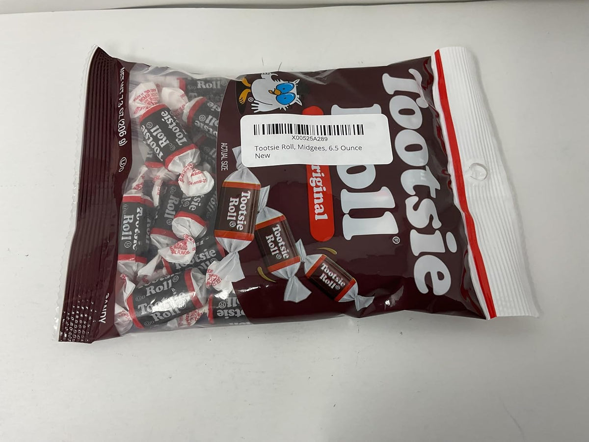 Tootsie Roll Midgees bite-sized individually wrapped chocolate candies spread out