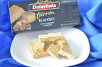Delaviuda Calidad Suprema soft almond nougat box displaying ingredient attributes.