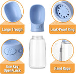 Nineteen ounce blue puppy water dispenser being operated with one hand