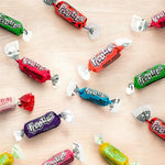 Close up of colorful Tootsie Roll Frooties fruit chews in candy bowl