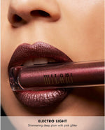 Milani Electro Light lip topper precision wand applicator and liquid glitter texture closeup